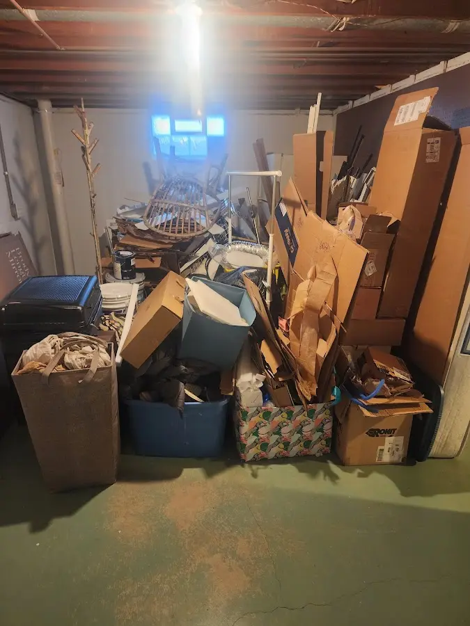 Roll-off dumpster container at job site for Yard Waste Dumpster Rental in Antwerp